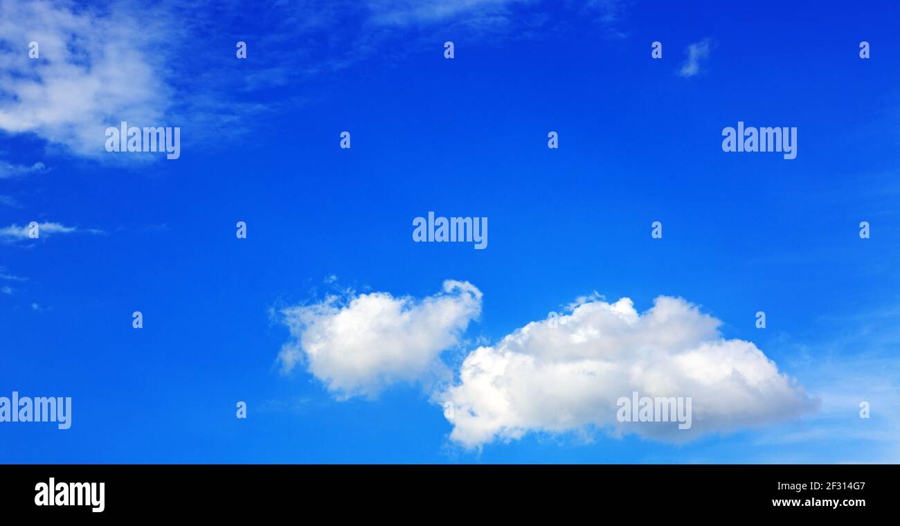Clouds and blue sky background with copy space Stock Photo - Alamy