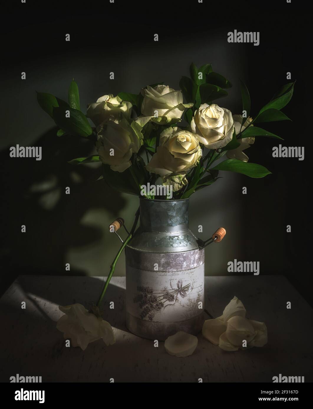 Still life with a bouquet of white withered roses. Vintage Stock Photo ...
