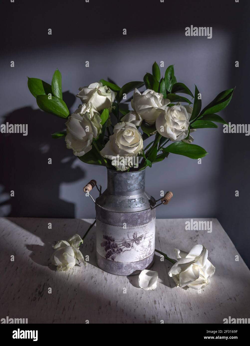 Still life with a bouquet of white withered roses. Vintage Stock Photo ...