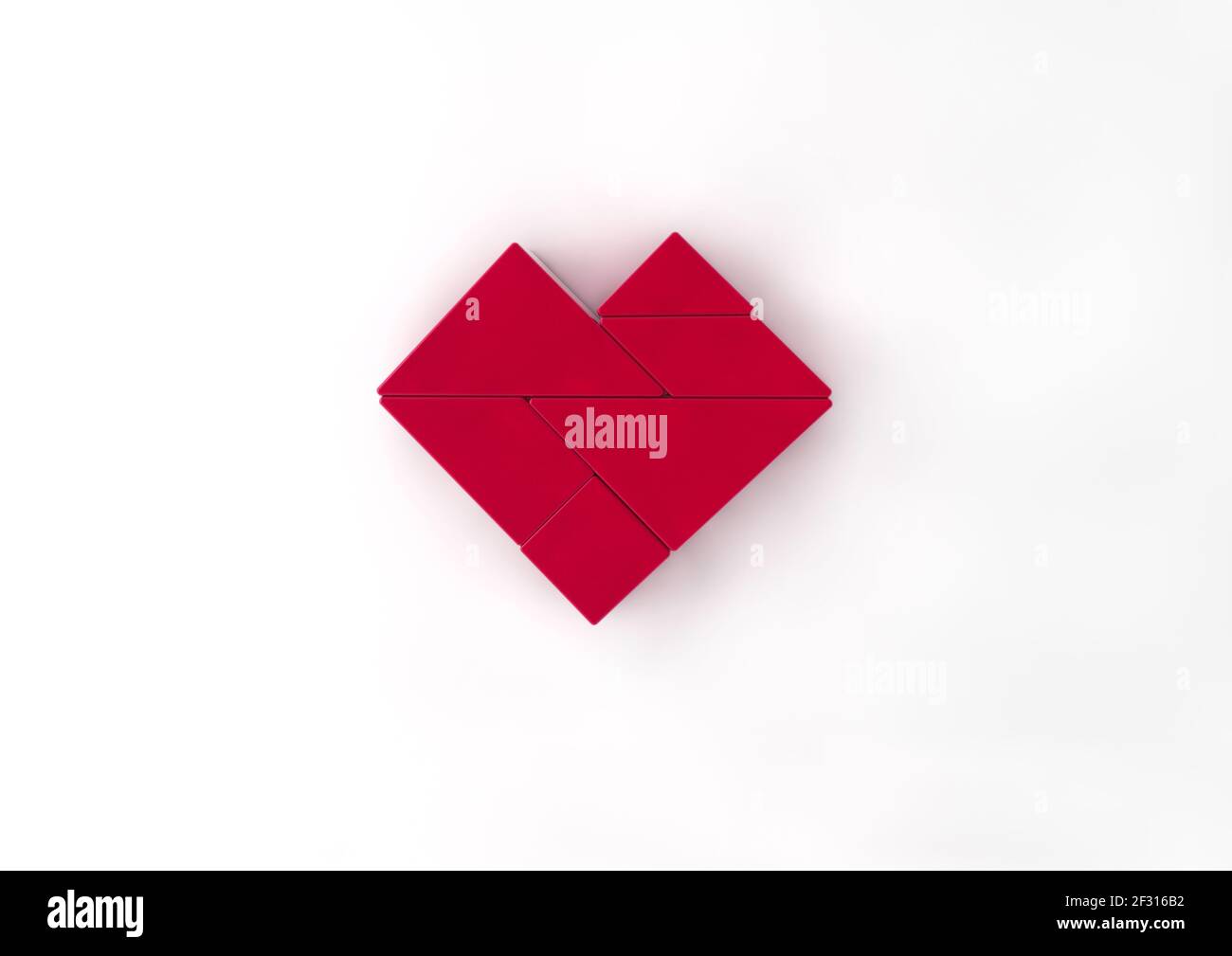 Red Heart tangram on white background. 3d rendering. Stock Photo