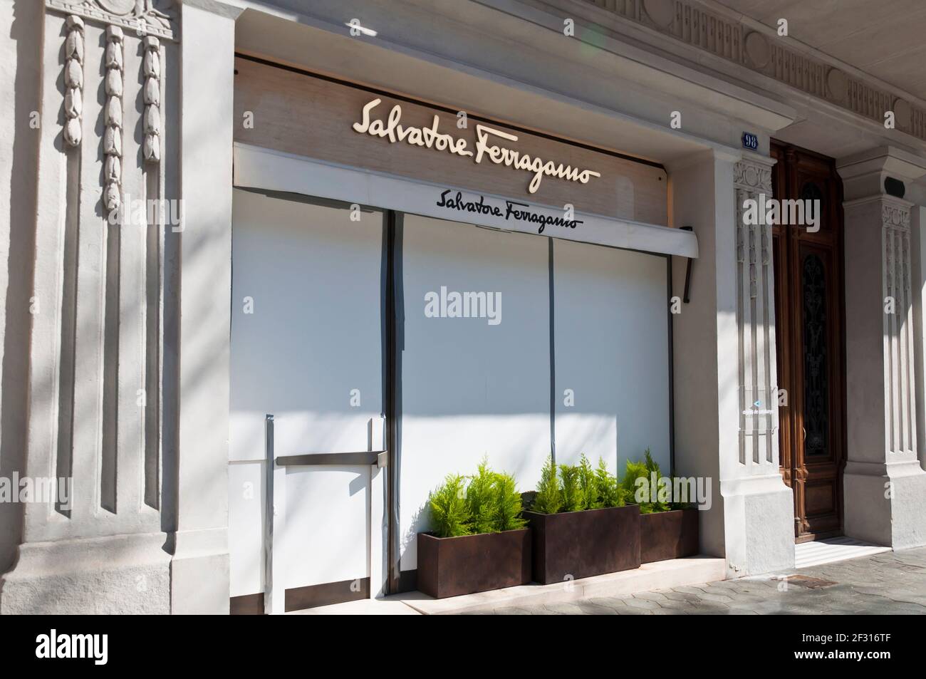 Closed business with vitrines protected after the riots for rap singer  Pablo Hasel's detention, Paseo de Gracia, Eixample District, Barcelona,  Spain Stock Photo - Alamy