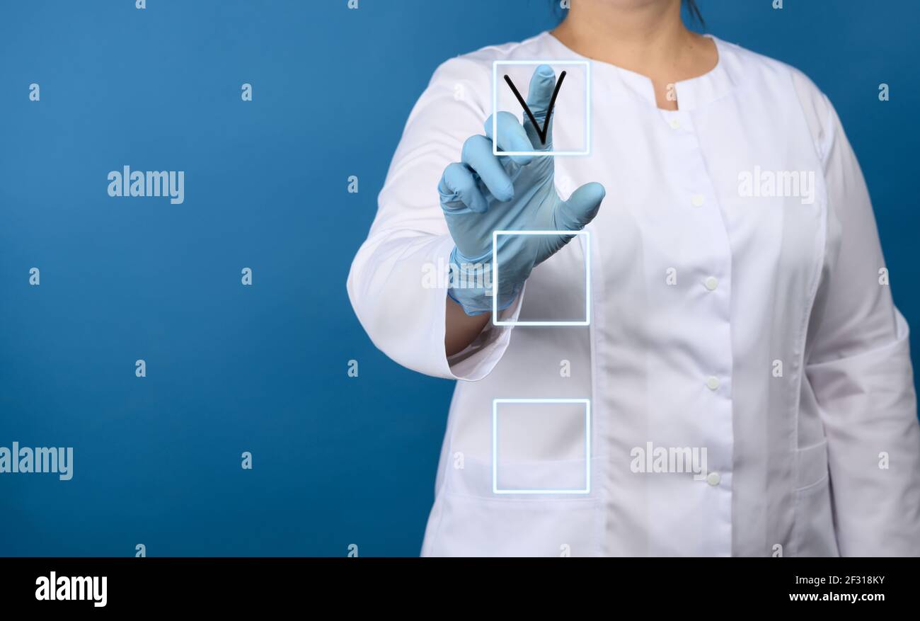 Hand touches and notes in the list on a virtual screen Stock Photo