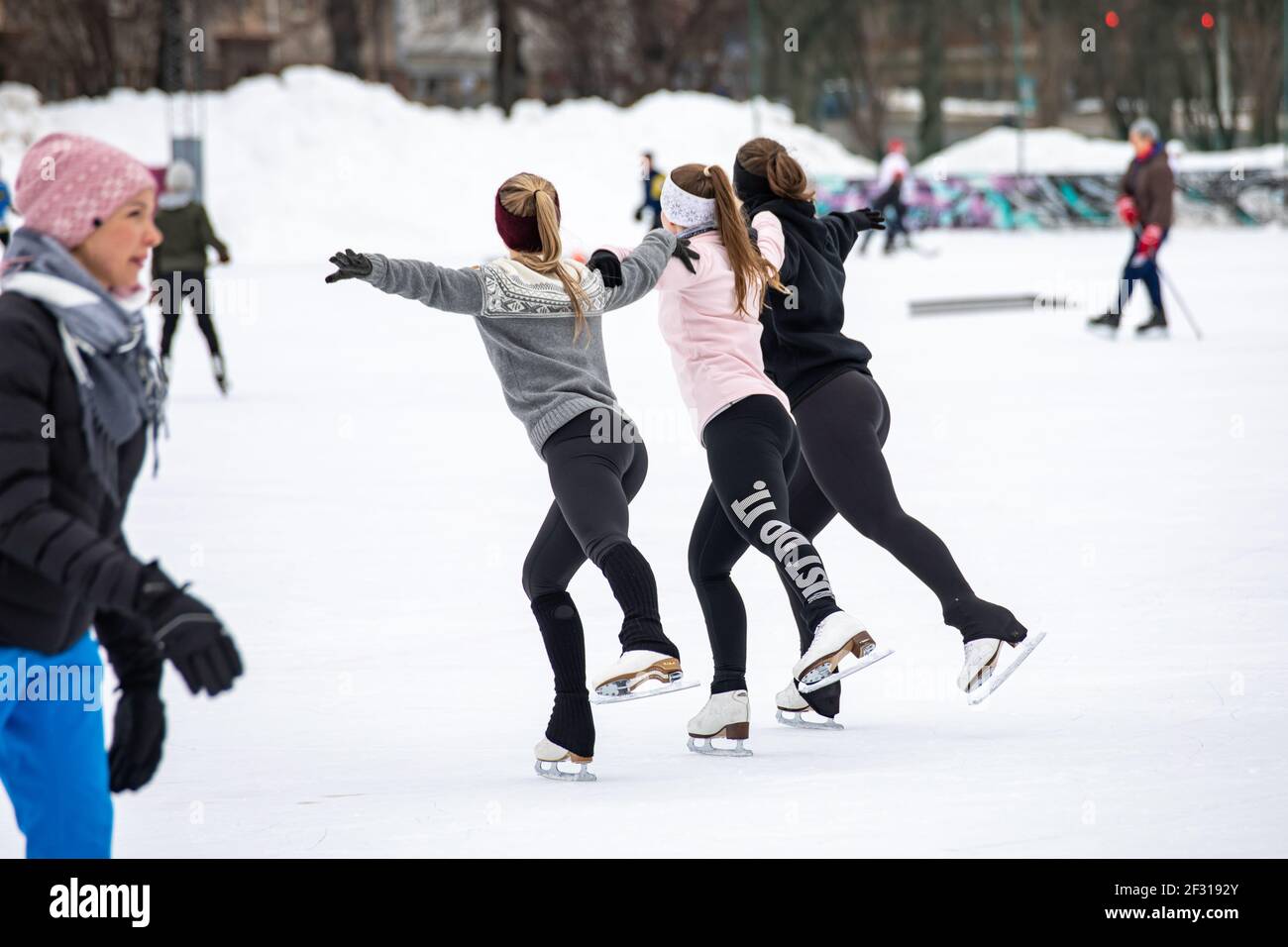 Teenage girls or young women practicing figure skating at Brahenkenttä