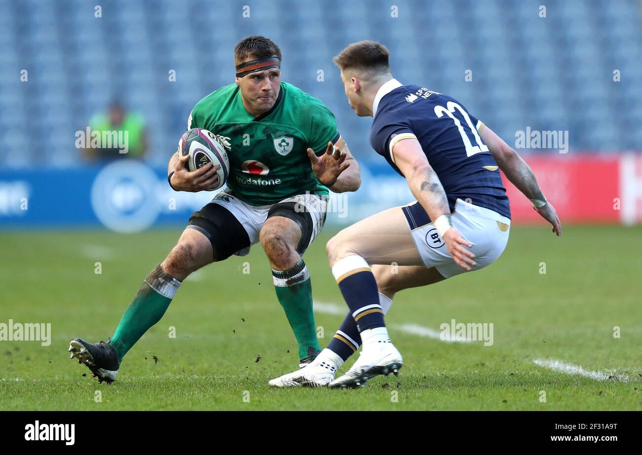 Ireland's CJ Stander (left) and Scotland's Huw Jones during the Guinness Six Nations match at BT Murrayfield Stadium, Edinburgh. Picture date: Sunday March 14, 2021. Stock Photo