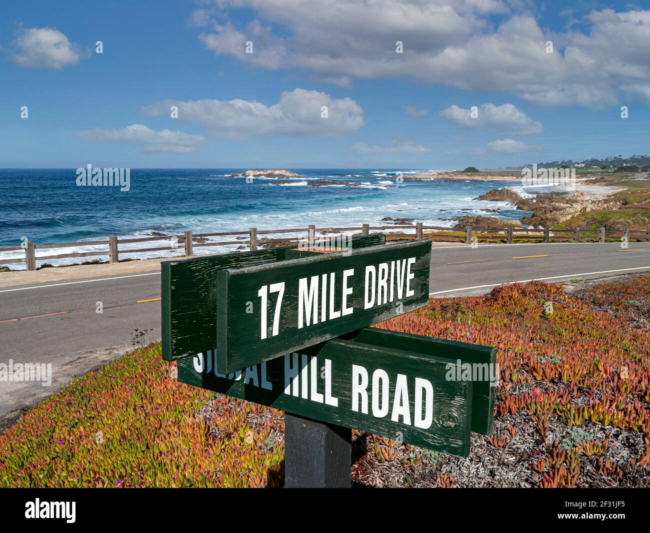 PEBBLE BEACH 17 mile drive coast road sign, scenic Pacific sea route through Pacific Grove and Pebble Beach on the Monterey Peninsula California USA - Stock Photo