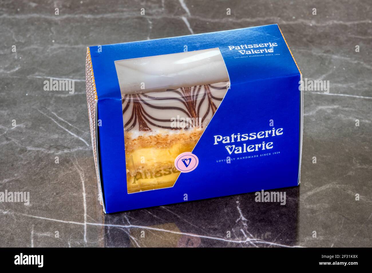 A Patisserie Valerie cream slice, sold pre-packaged in a supermarket. Stock Photo