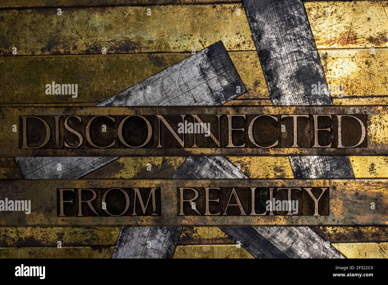Disconnected From Reality text on vintage textured grunge copper and gold background Stock Photo