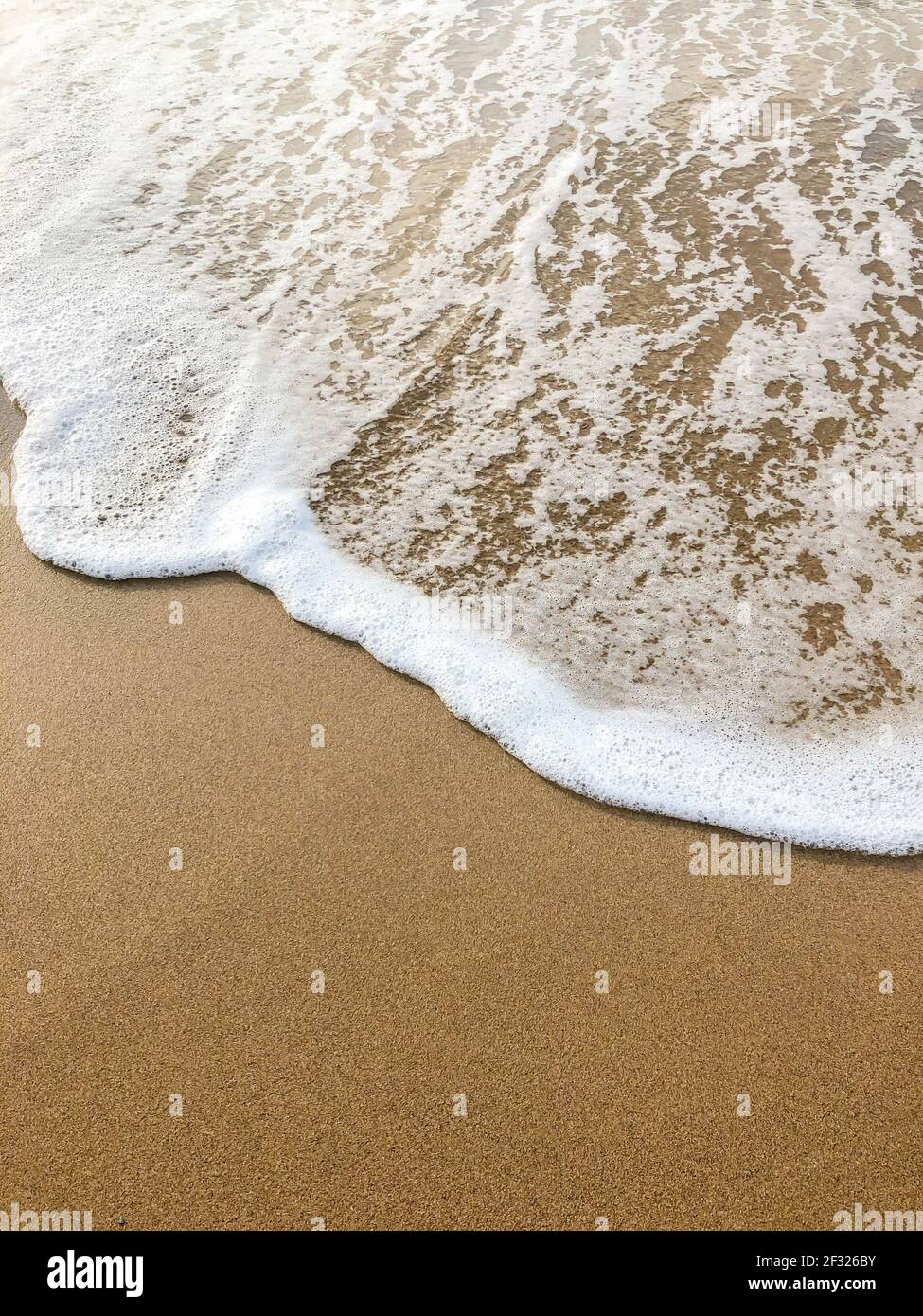 Smooth waves sea on sandy hi-res stock photography and images - Alamy