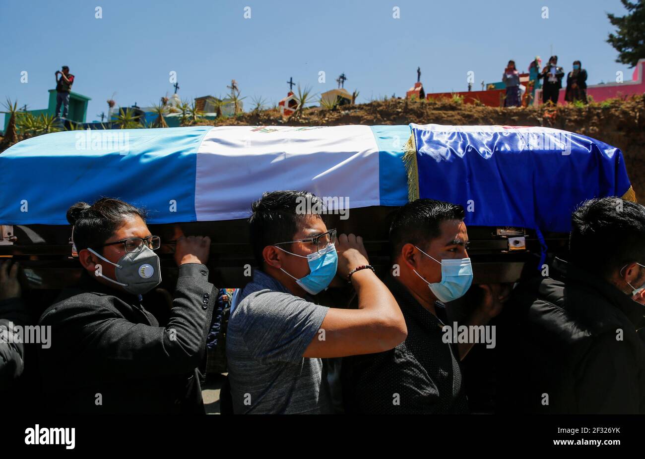People carry the coffin containing the body of Adan Coronado Marroquin, one  of the migrants killed in the Mexican state of Tamaulipas while trying to  reach the U.S., during his funeral in