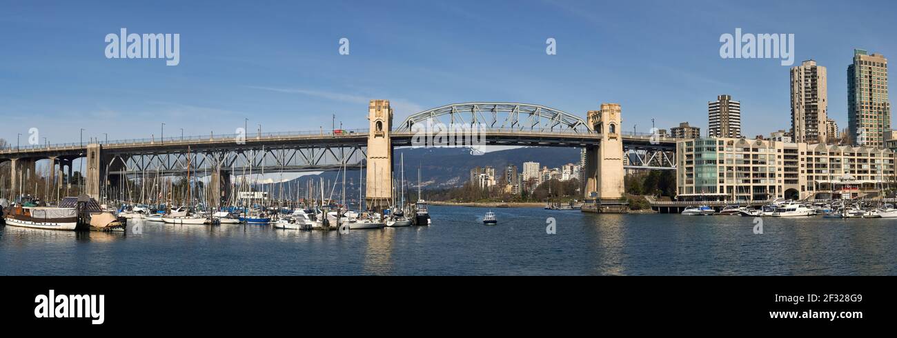 Stitched panorama of False Creek with the Burrard Street Bridge in the background from Granville Island , Vancouver, British Columbia, Canada Stock Photo
