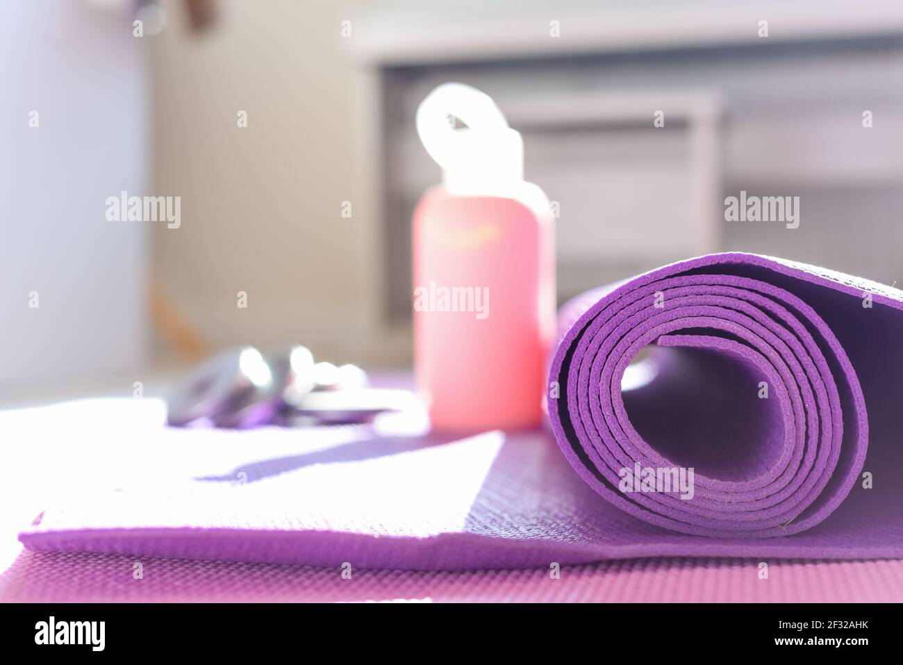https://c8.alamy.com/comp/2F32AHK/yoga-mat-and-gym-equipment-for-healthy-lifestyle-and-fitness-background-2F32AHK.jpg