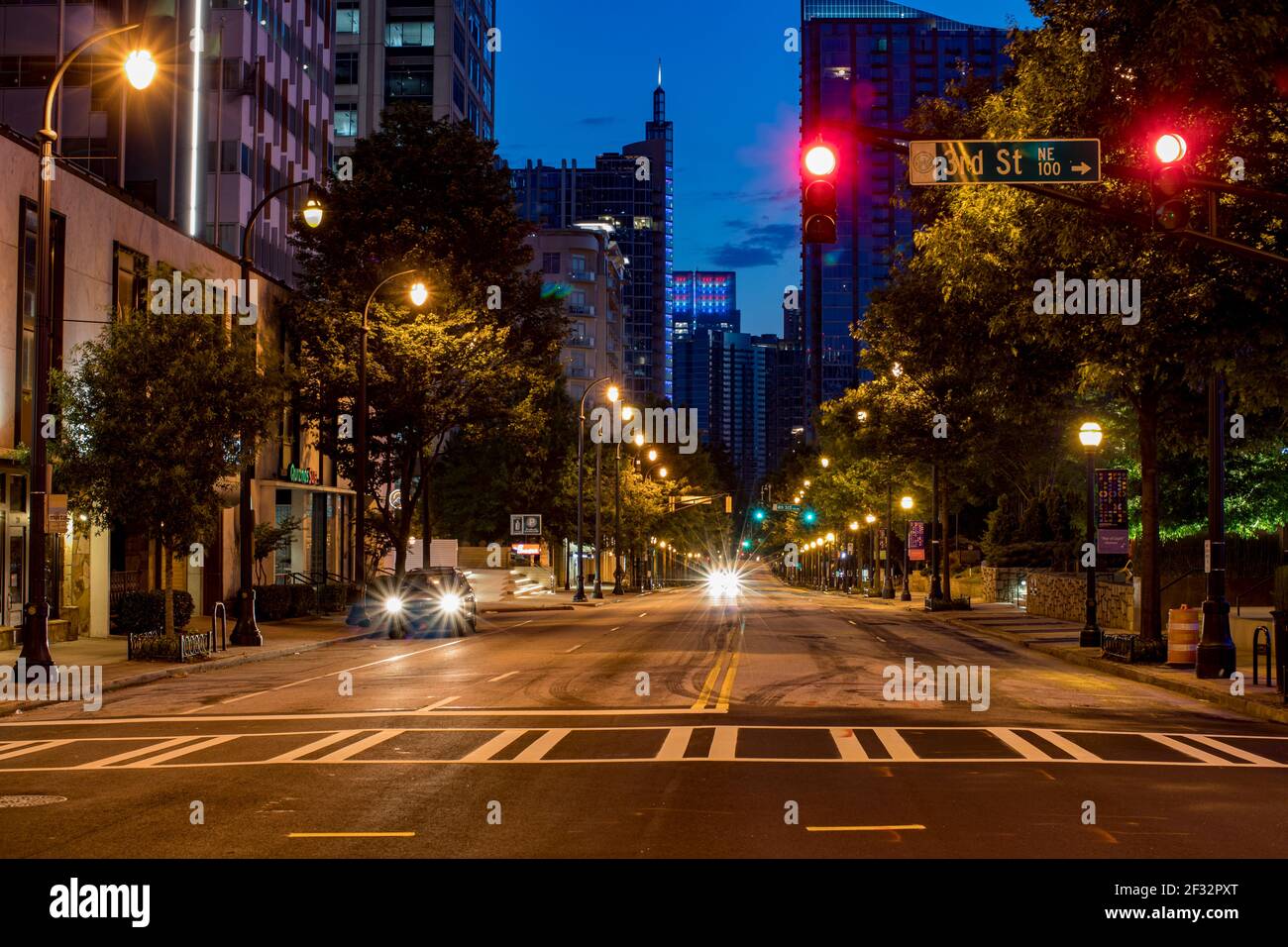 Atlanta, Ga USA - 06 14 20: Downtown Atlanta 3rd street at night traffic red light Stock Photo