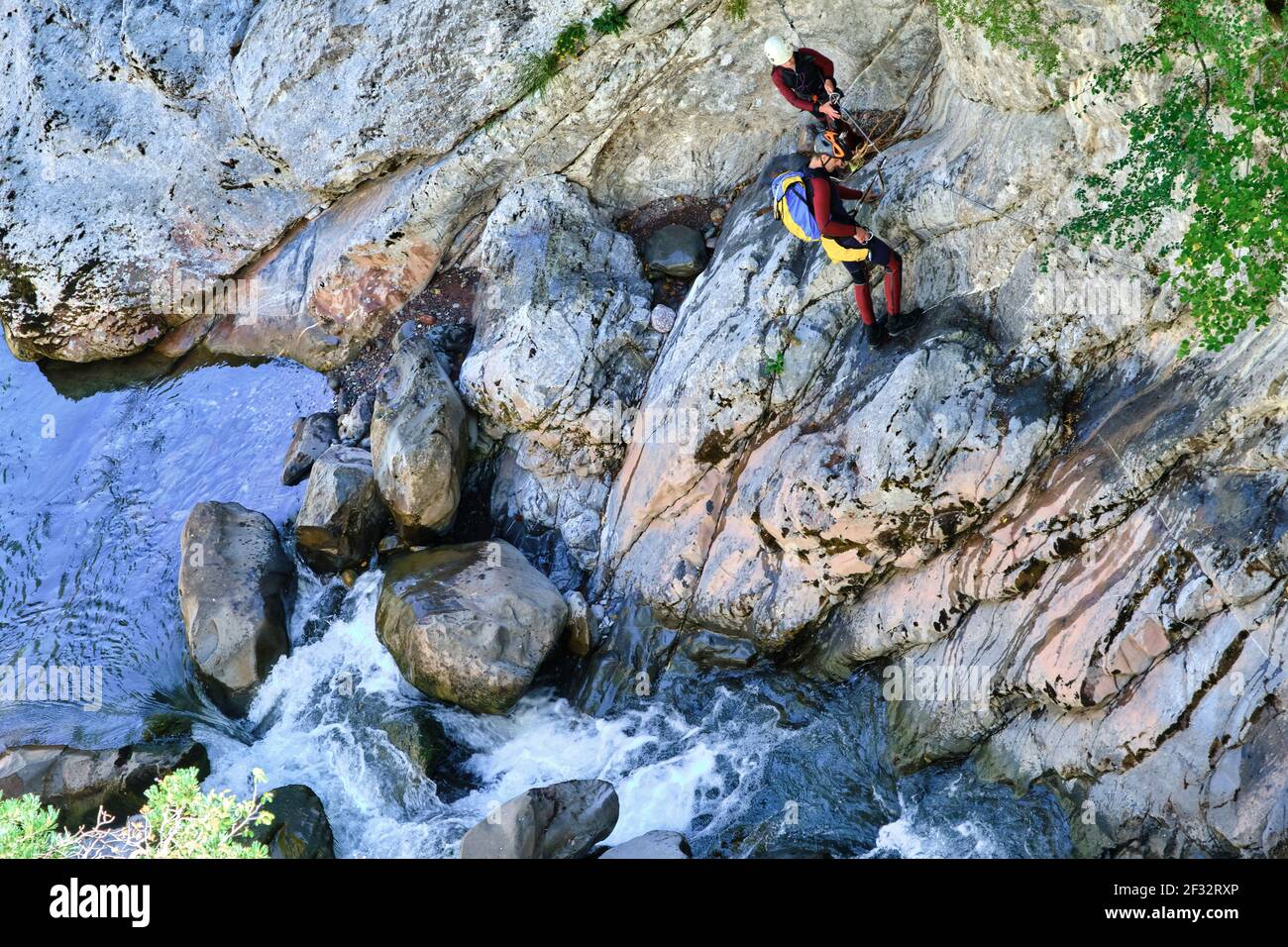 People doing canyon hiking in Aragon Subordan river. Hecho valley. Pyrenees mountain Range, Huesca, Aragon, Spain, Europe. Stock Photo
