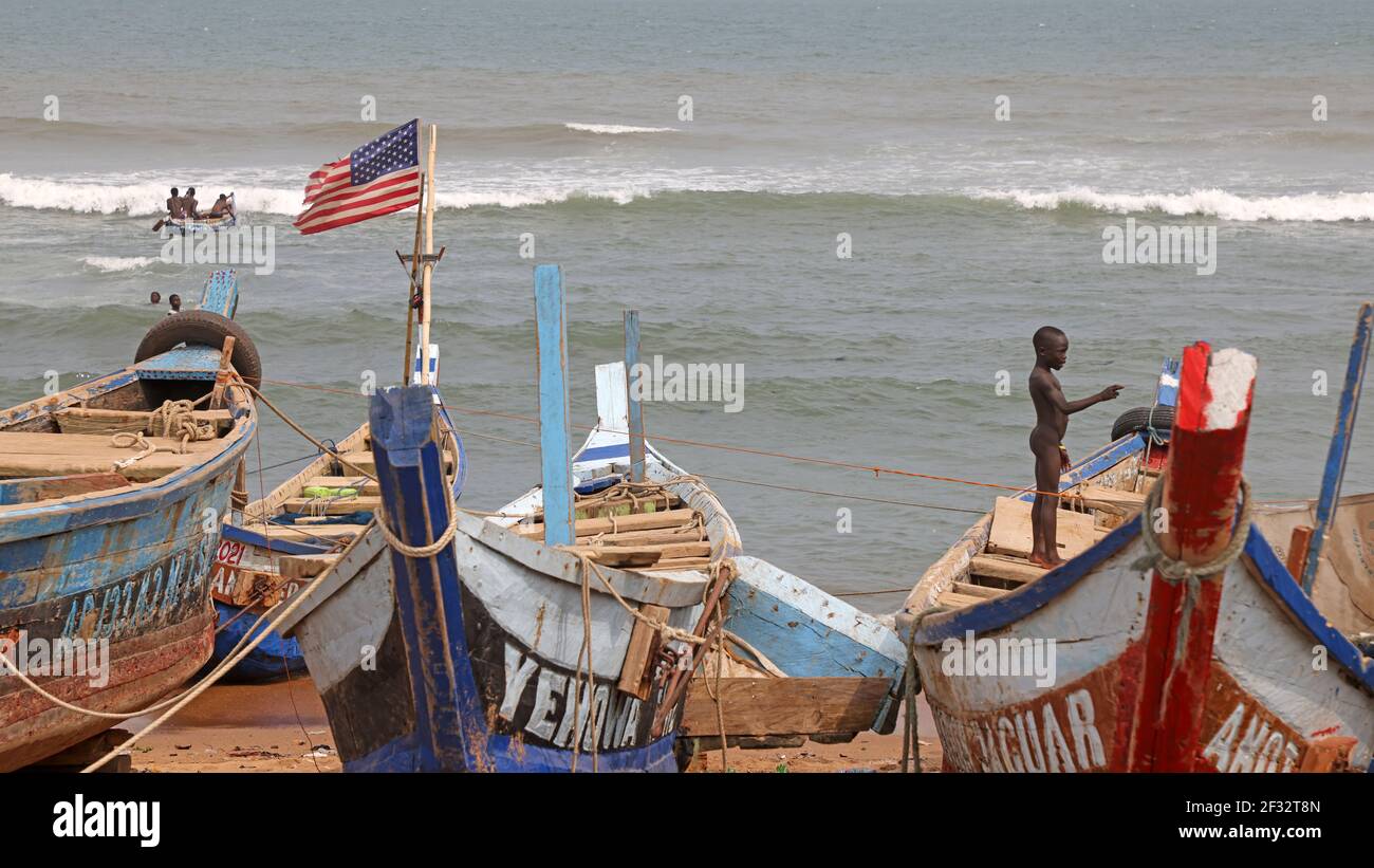 Dugout fishing canoe boat Liberia Africa. Handmade wooden boats for