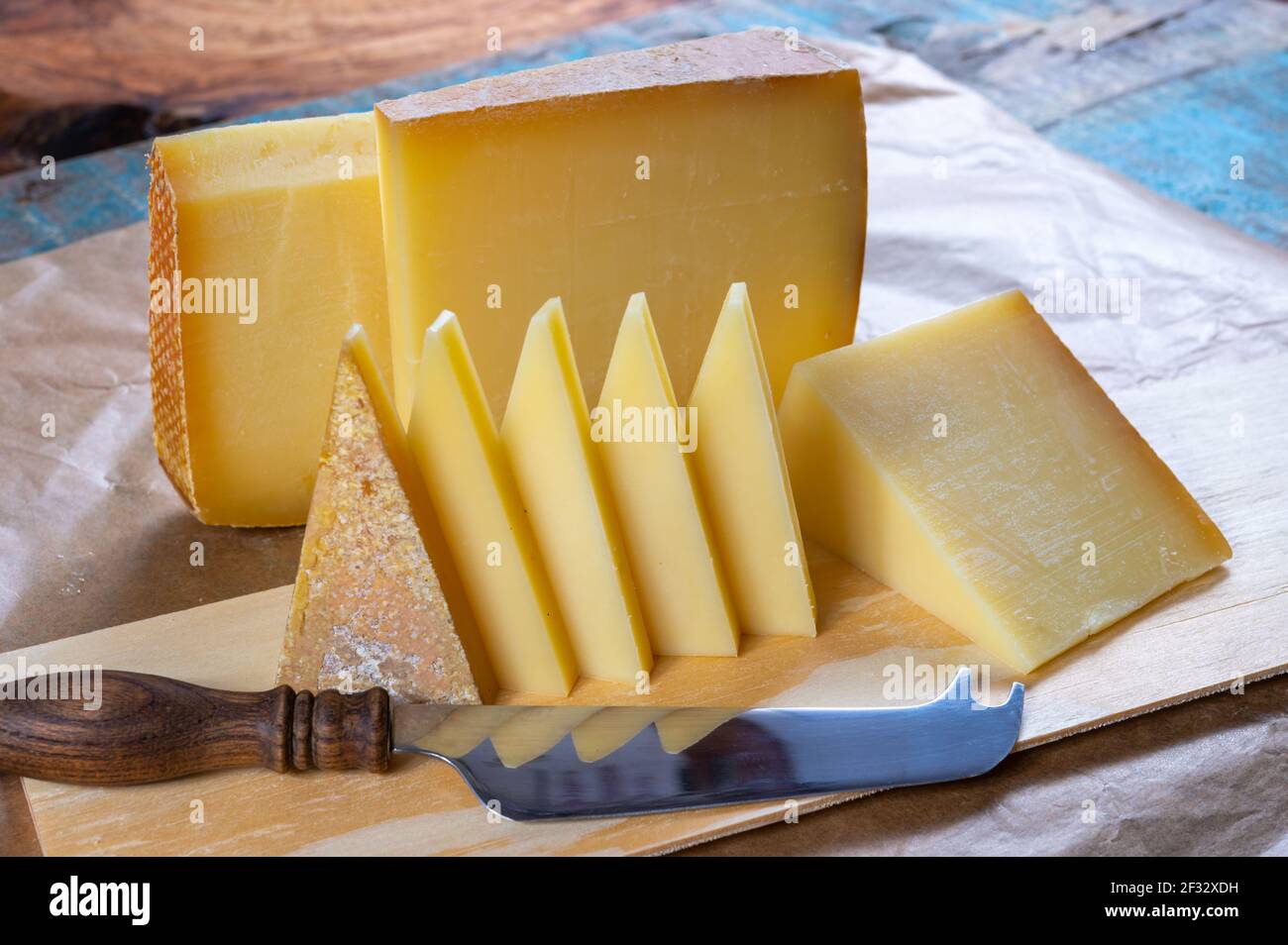 Cheese collection, French comte and Swiss gruyere cheeses close up