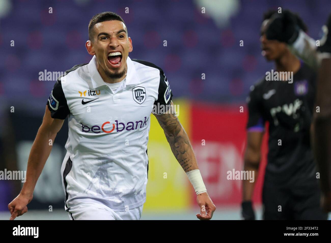 BRUSSEL, BELGIUM - MARCH 14: Daniel Munoz of KRC Genk celebrating goal of Paul Onuachu of KRC Genk (not in picture) during the Croky Cup match between Stock Photo