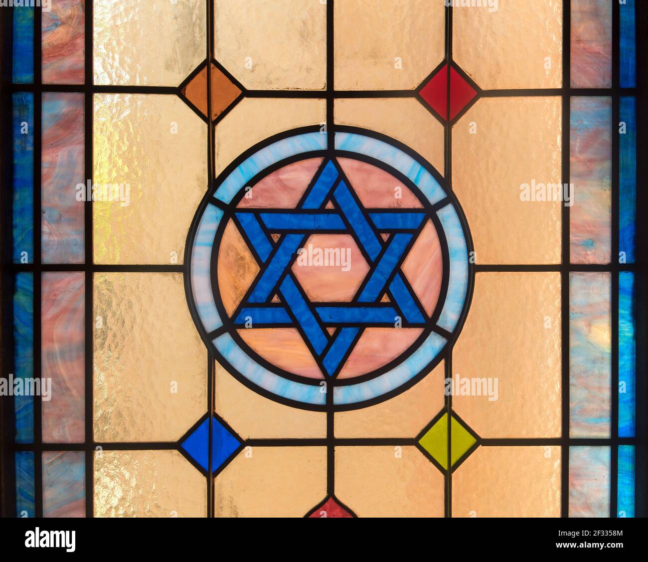 Star of David in Synagogue Stained Glass Window Stock Photo