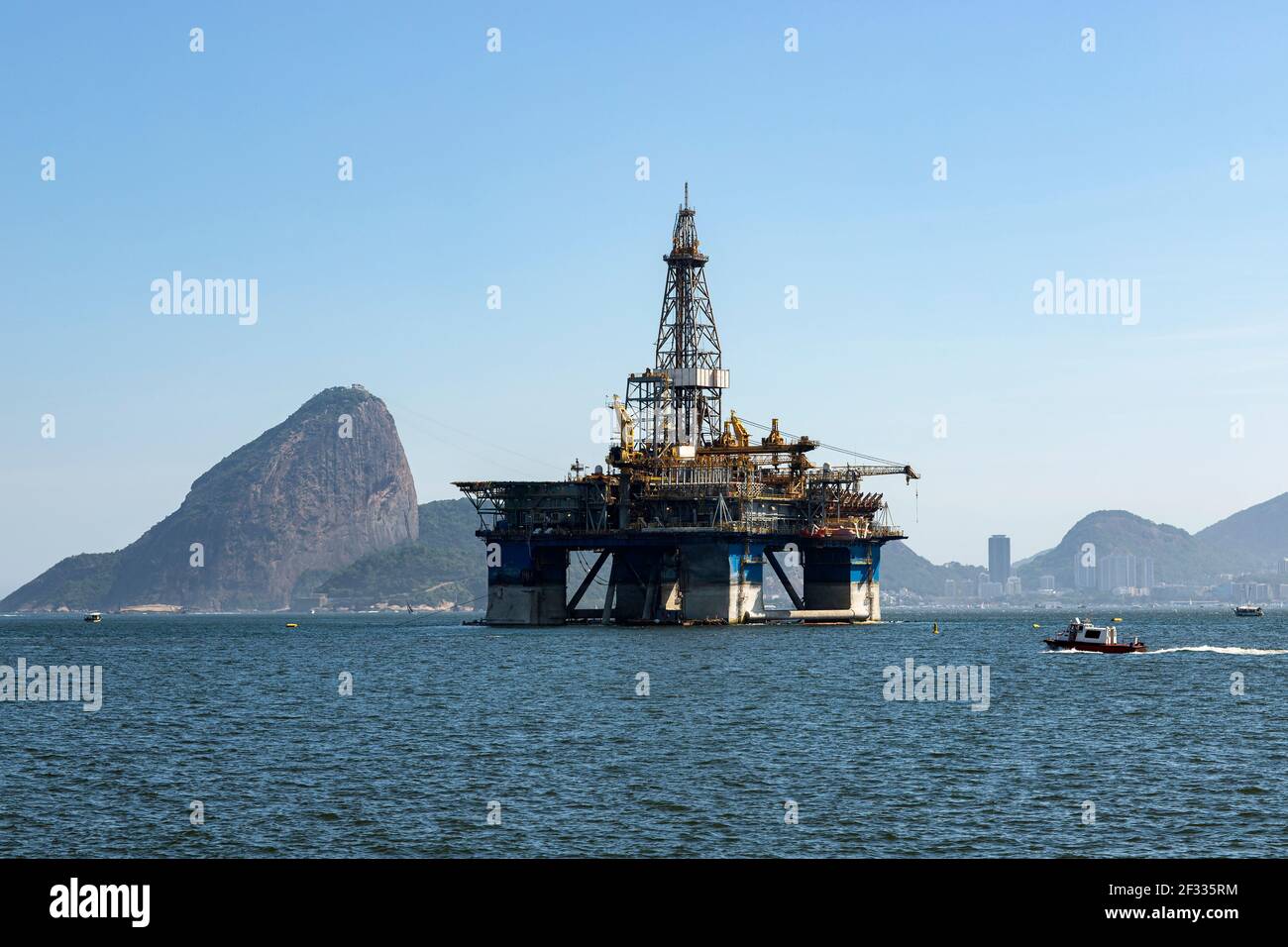 Oil from Brazil. Oil drilling rig against the panorama of Rio de
