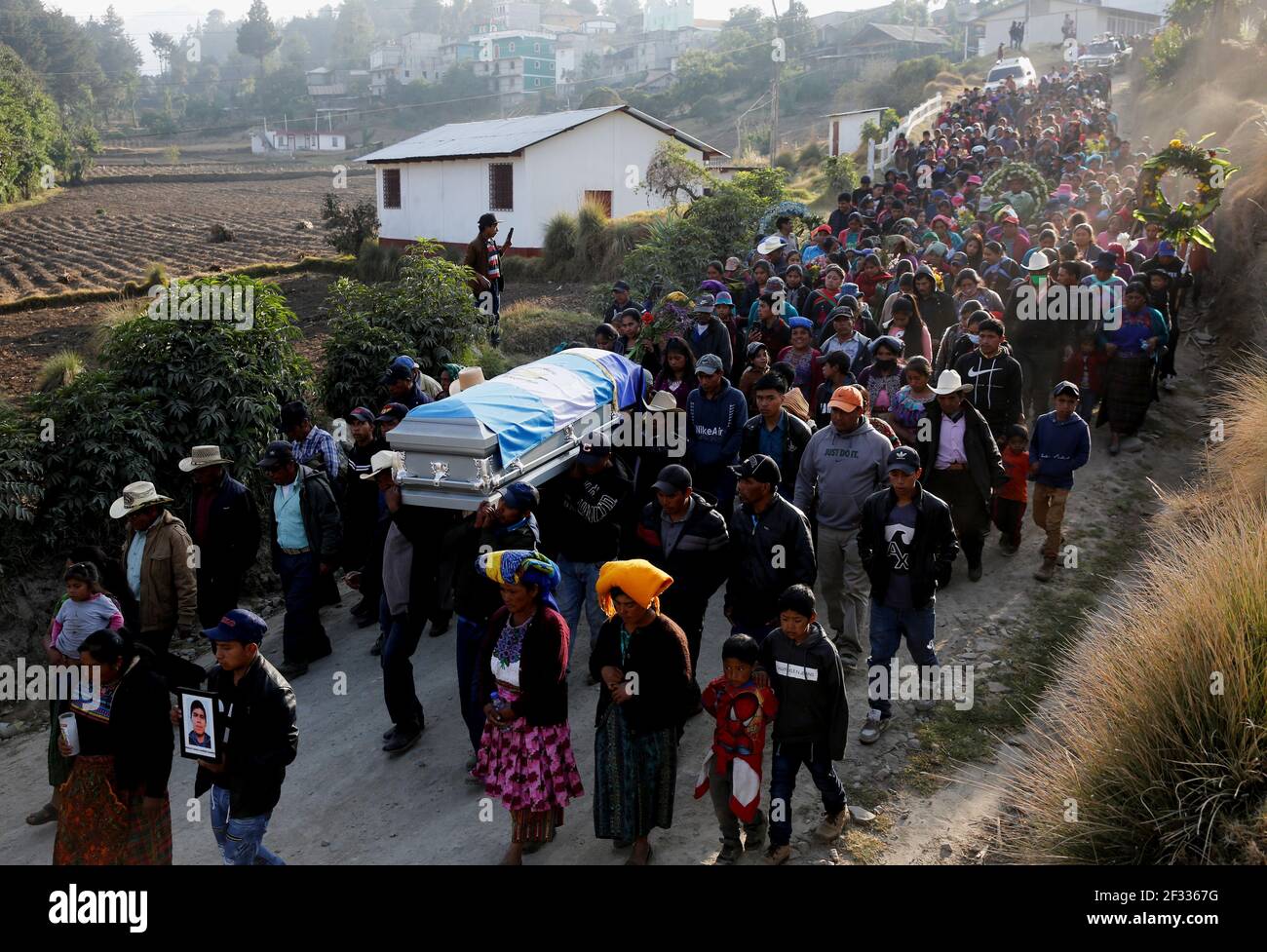 People carry the coffin with the body of Rivaldo Jimenez Ramirez, a migrant  killed in the Mexican state of Tamaulipas while trying to reach the U.S.,  during his funeral in Comitancillo, Guatemala,