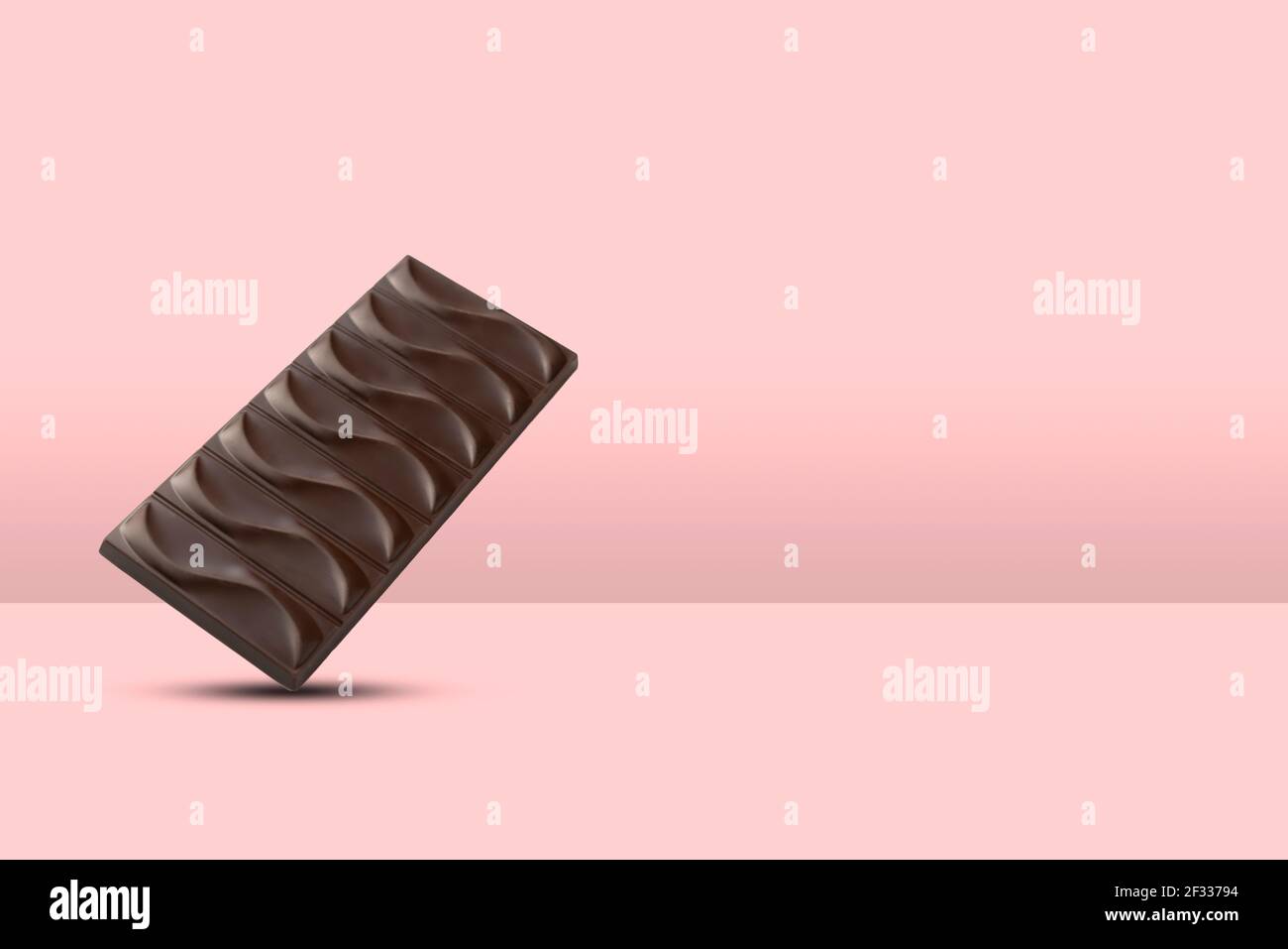 isolated chocolate square bar dessert. sweet candy dark brown piece