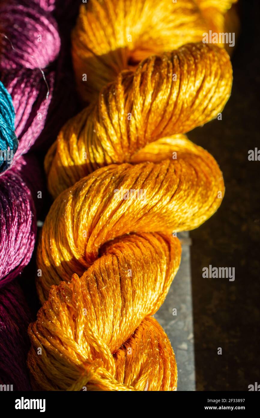 Colorful strands of silk thread close up texture background Stock Photo ...