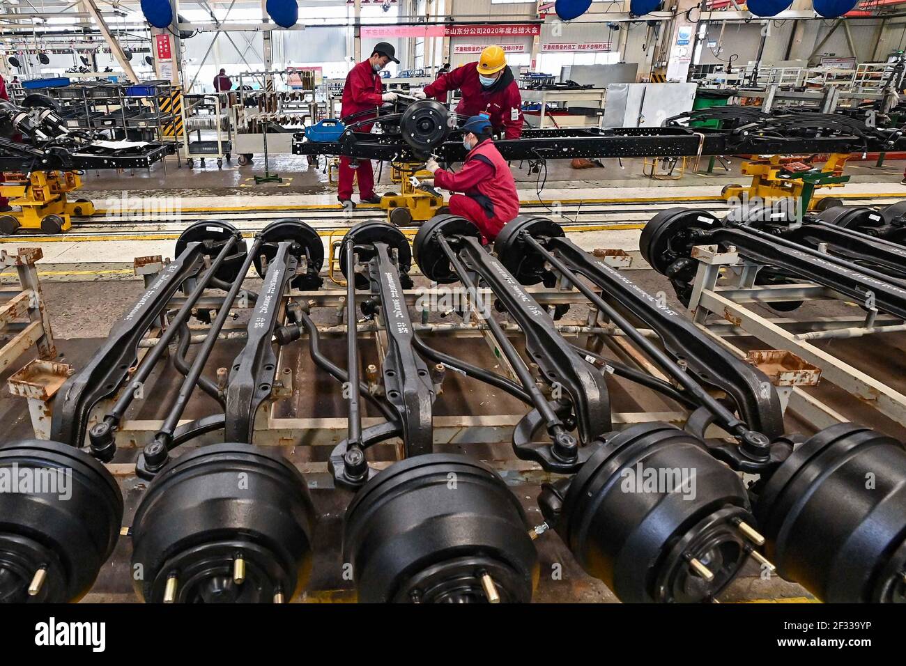 QINGZHOU, CHINA - MARCH 15, 2021 - Workers work at a production ...
