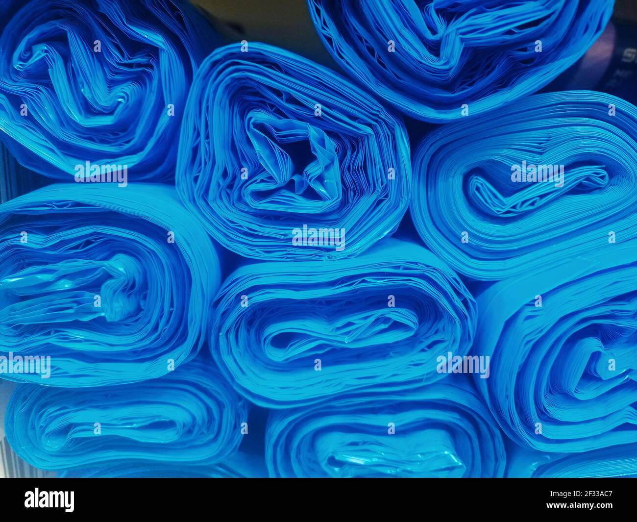 Garbage bags. A stack of plastic bags for storing garbage. Blue trash