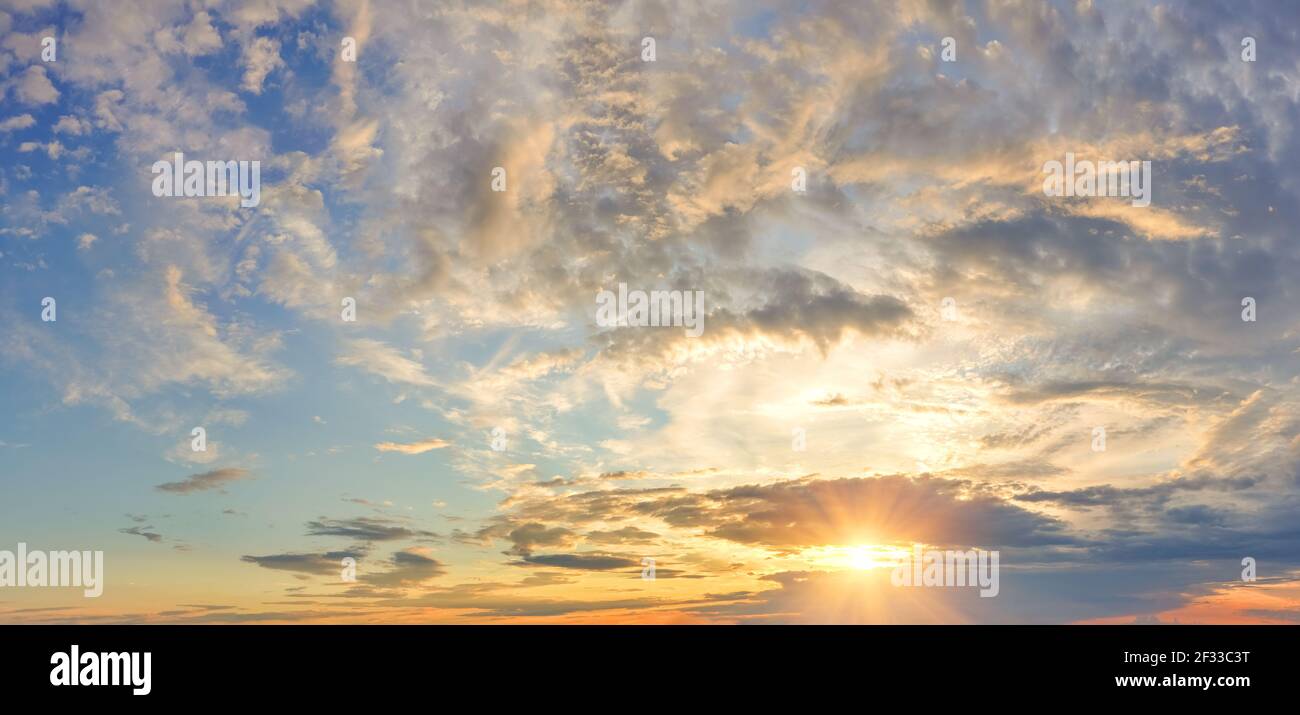 Panorama of dramatic colorful sky at sunset Stock Photo