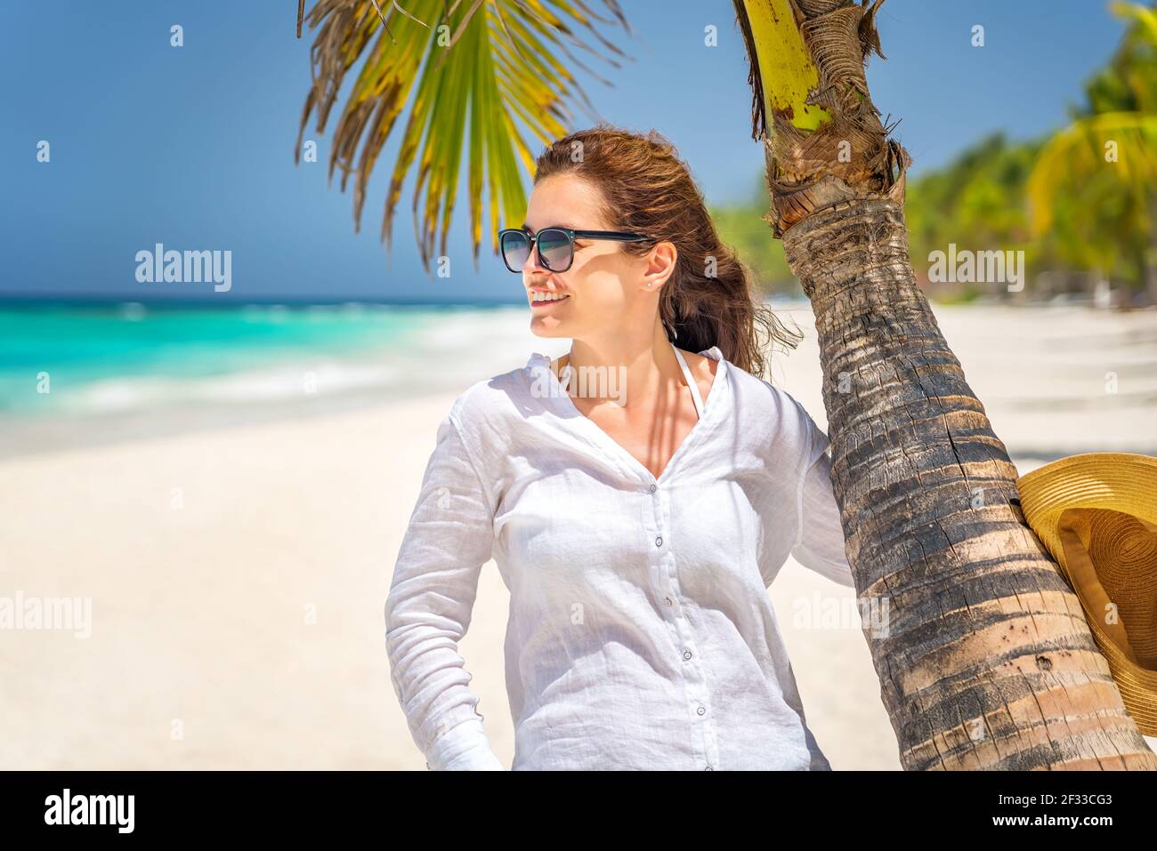 Young woman on the beautiful ocean beach in Dominican Republic Stock Photo