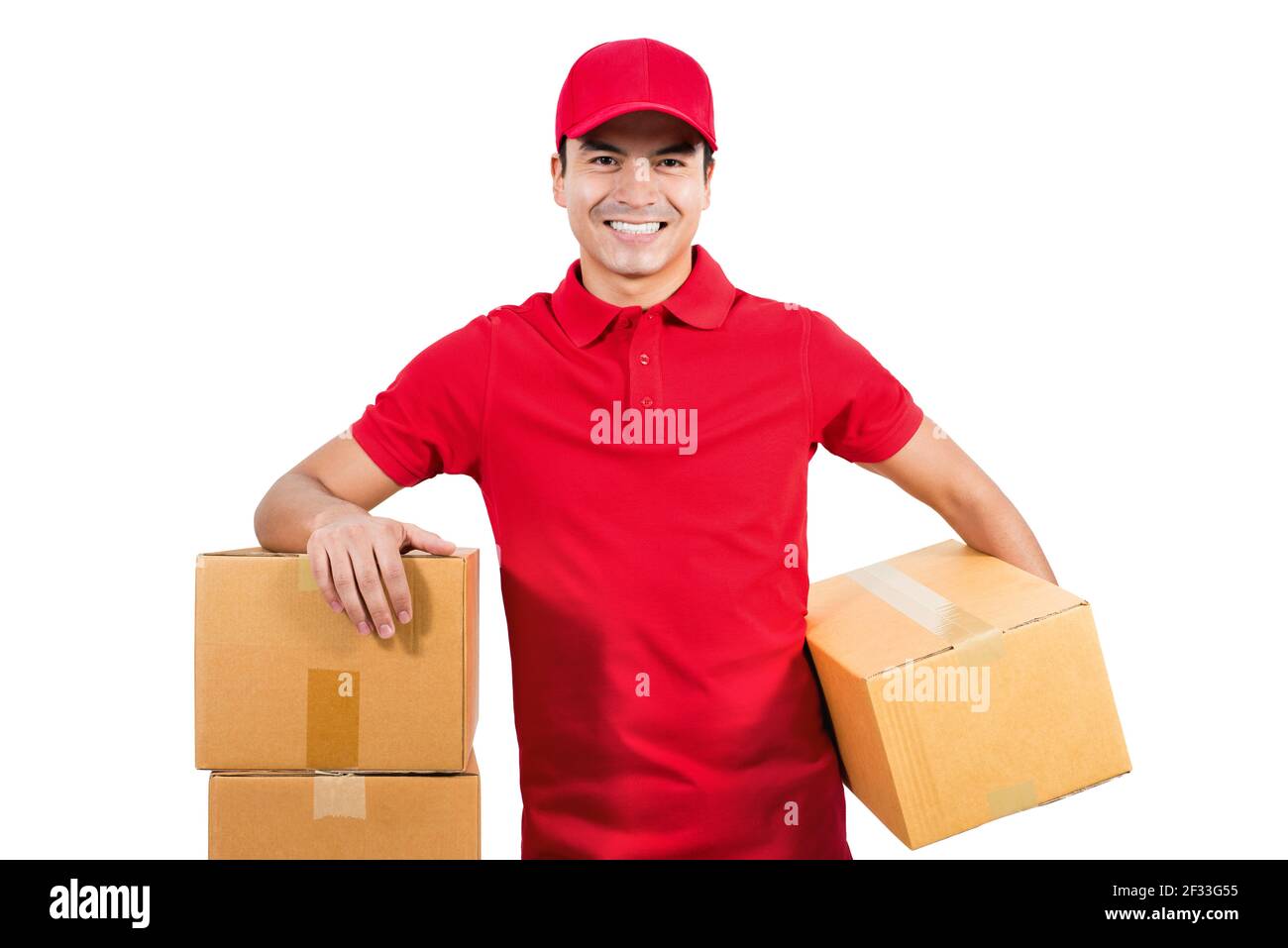 Smiling handsome delivery man in red uniform on white background