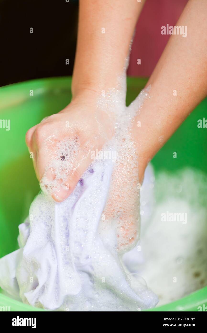 Hand washing clothes hi-res stock photography and images - Alamy