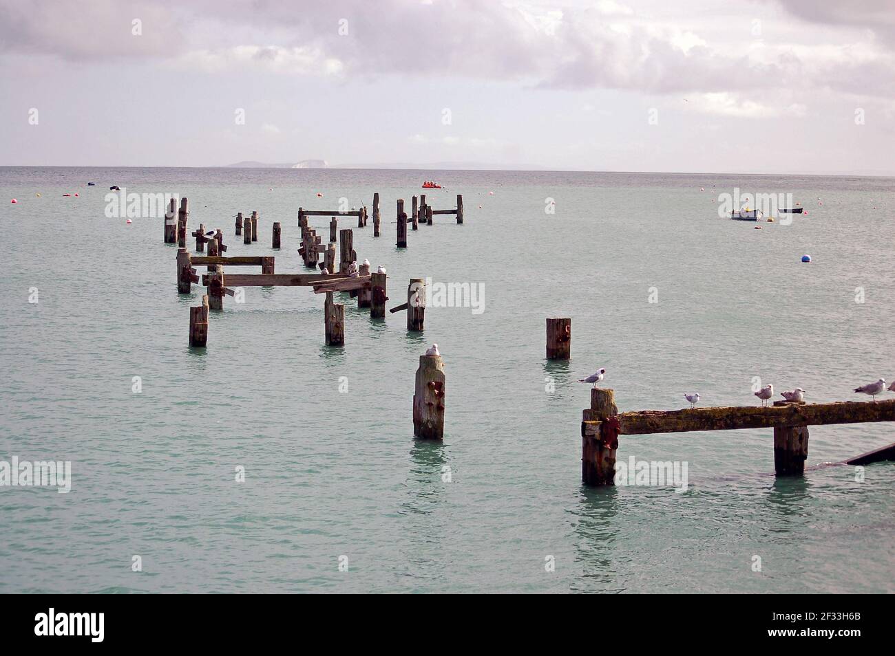 The ruined old pier at Swanage, Dorset Stock Photo