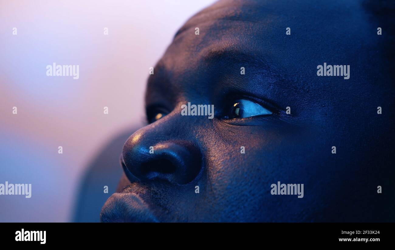 Close up eyes of black man in shock shaking his head. High quality photo Stock Photo