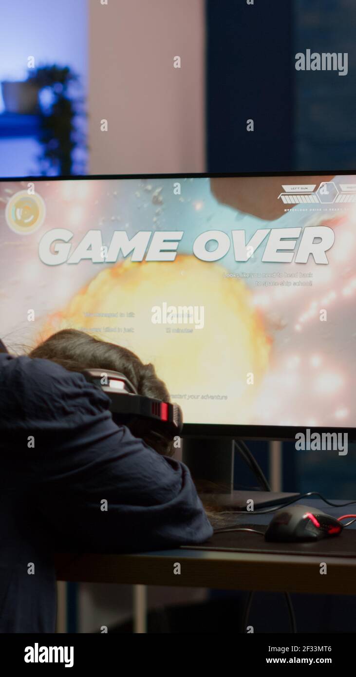Angry pro woman gamer losing space shooter video game during online ...