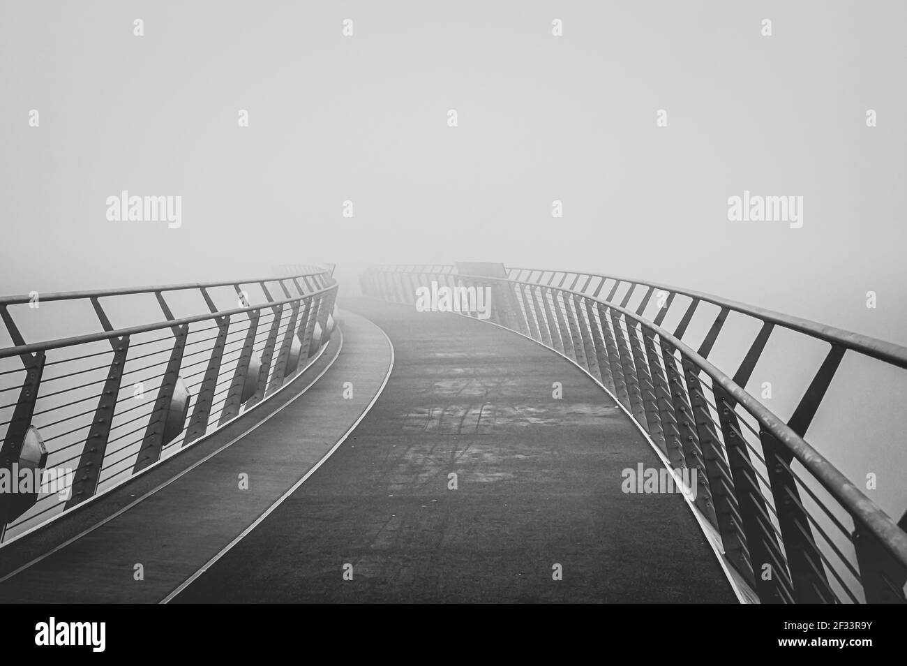 Fog covering the Peace Bridge in Derry Northern Ireland Stock Photo