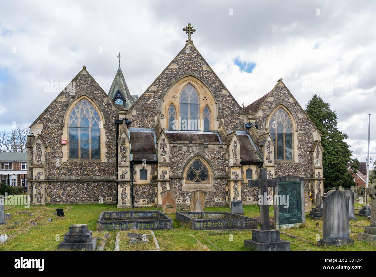 Holy Trinity Church, a flint built with steeple Church of England