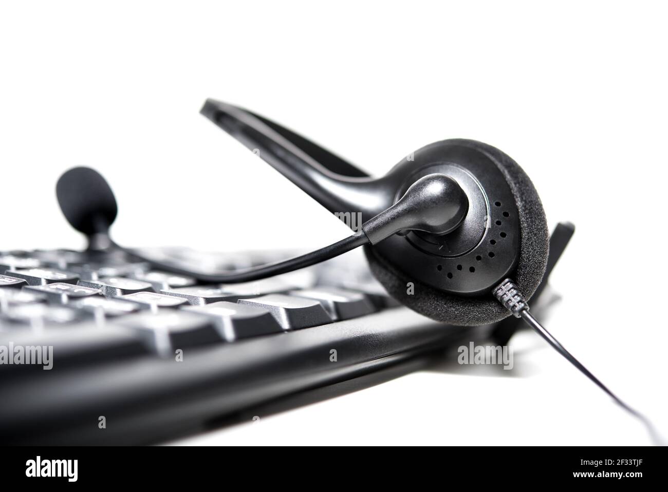 Headset with microphone on computer keyboard - call center concept ...