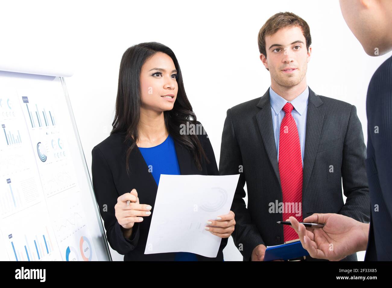 Business people discussing (presenting) work in the office Stock Photo
