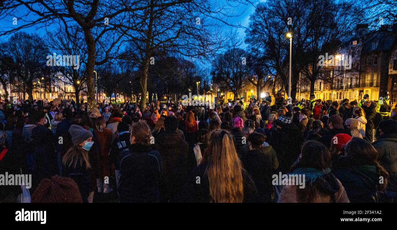 Brighton UK 13th March 2021 - Hundreds of people take part in a candlelit vigil for murder victim Sarah Everard in Brighton this evening . Reclaim These Streets protesters gathered in Brighton's Valley Gardens to take part in the vigil before police started to move them on after about half an hour:  Credit Simon Dack / Alamy Live News Stock Photo