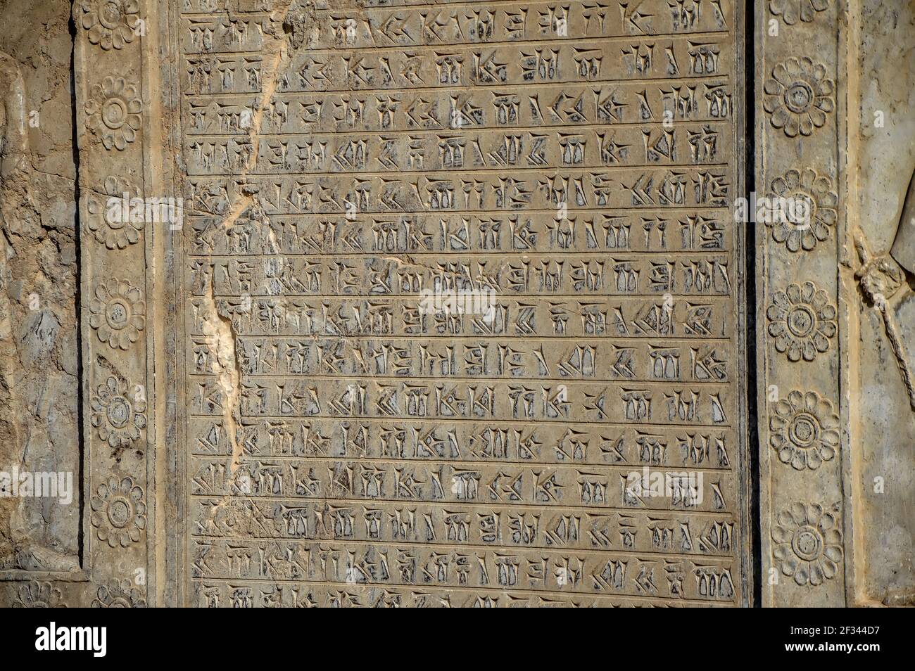 A tablet with cuneiform inscriptions at Apadana stairs in Persepolis, the ancient capital of the Persian empire, located near Shiraz in Iran Stock Photo