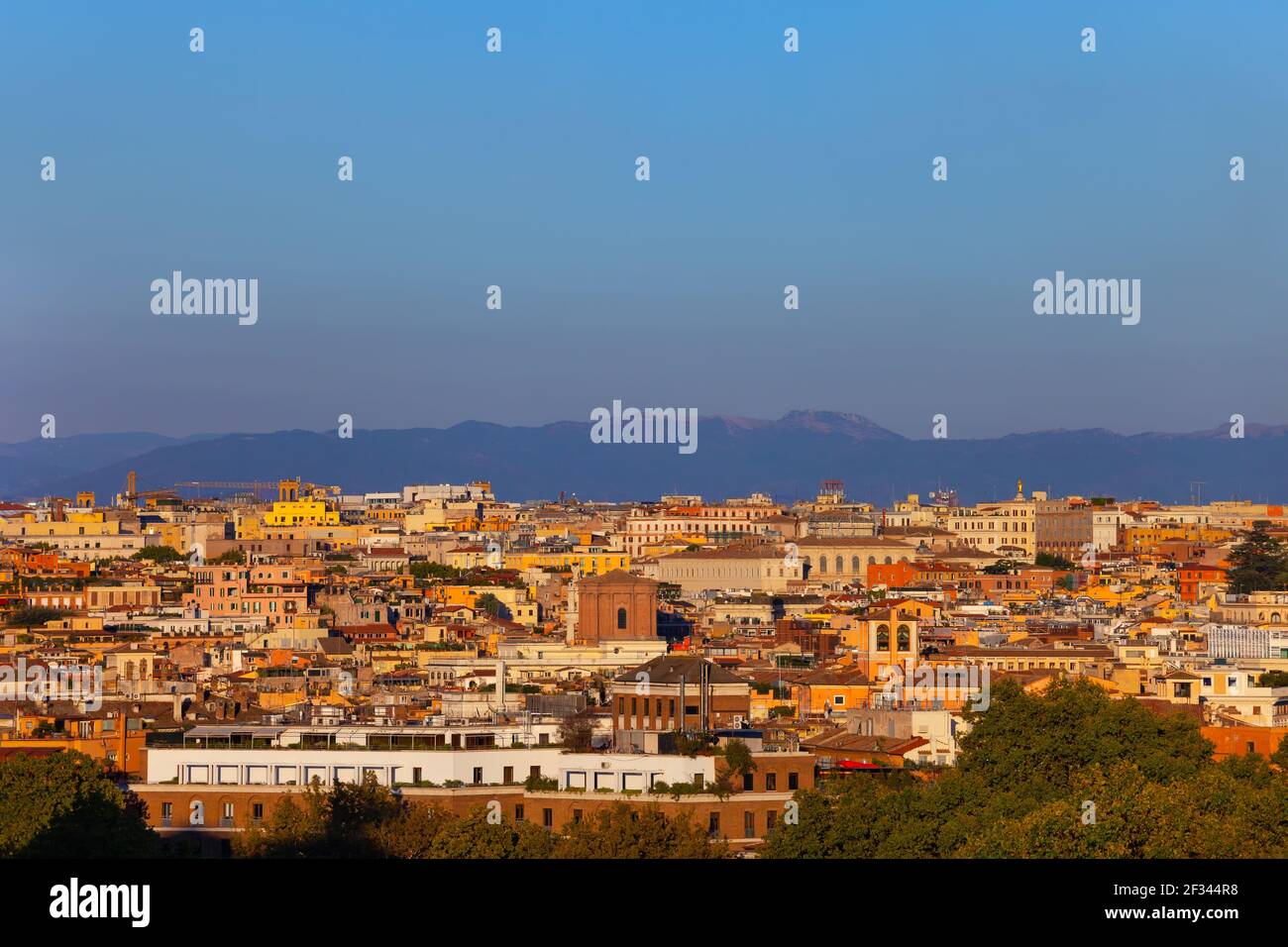 City of Rome at golden hour sunset in Italy, cityscape from the Janiculum Hill (Gianicolo). Stock Photo