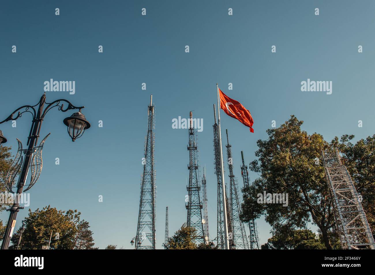 turkish flag and forged lantern near tv towers Stock Photo