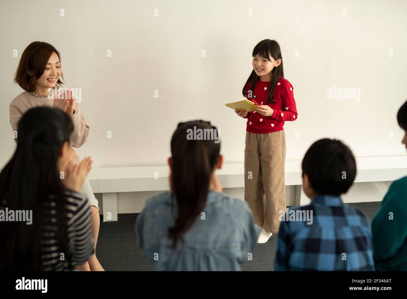 Child Giving Presentation Stock Photo