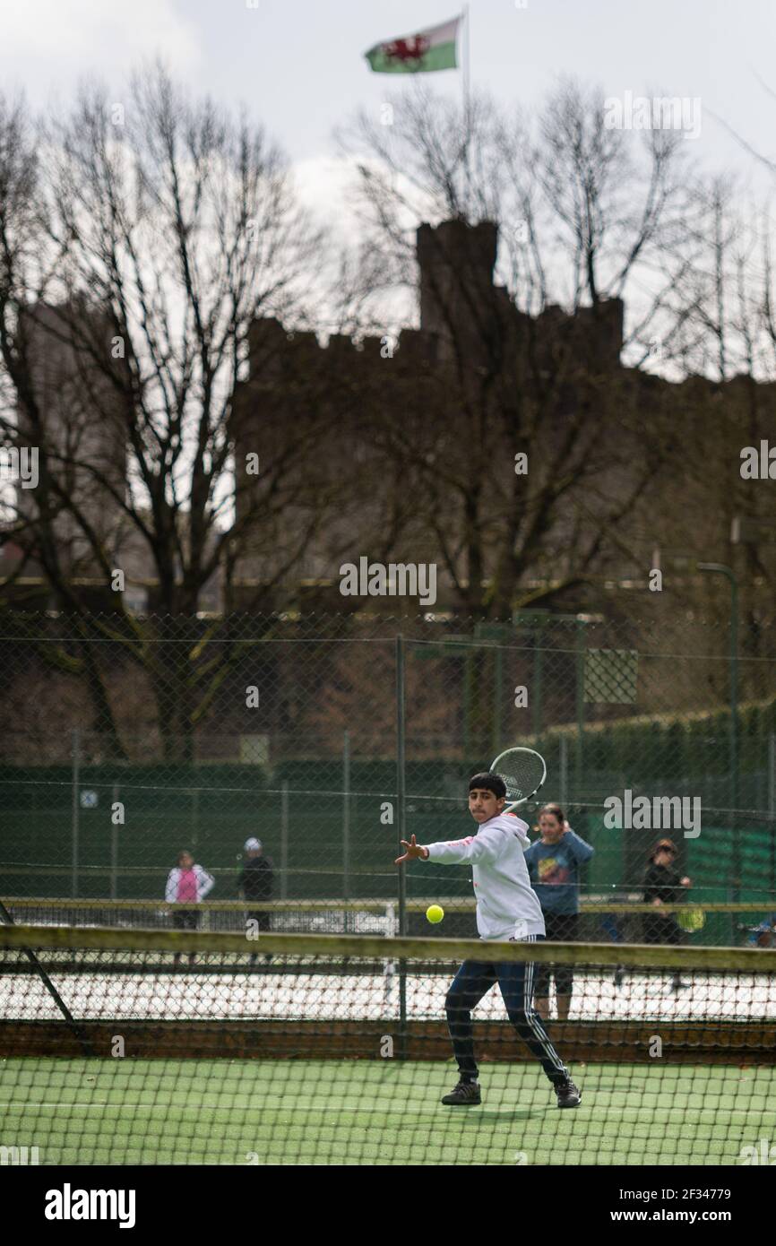 Cardiff, Wales, UK. 13th March 2021. Pictured: Tennis players both young  and old practice their game at Cardiff Lawn Tennis Club. / Wales ended the  Stock Photo - Alamy