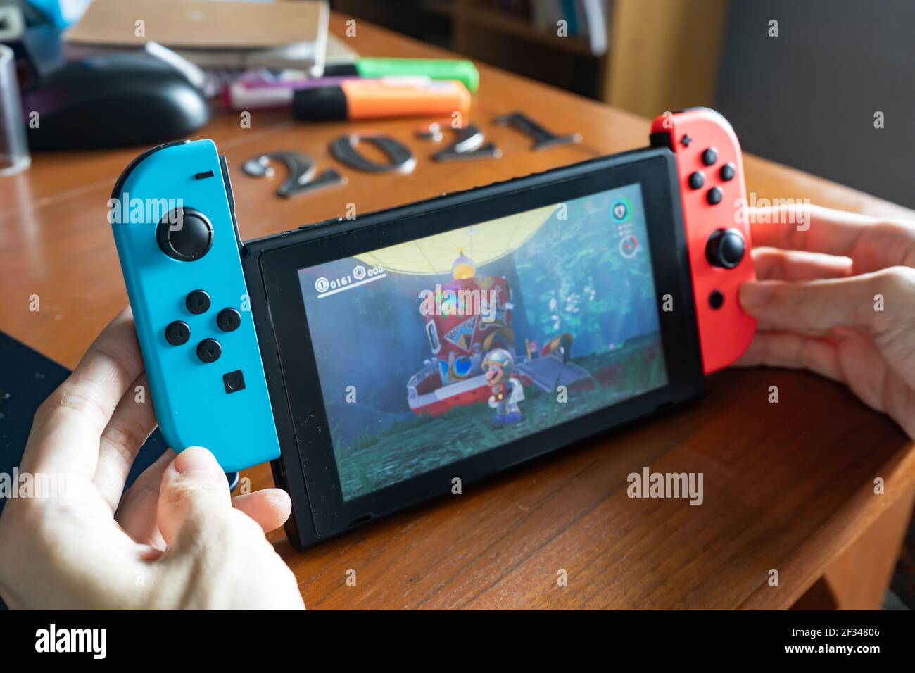 Bangkok, Thailand - March 4, 2021 : A man playing Nintendo Switch game  console Stock Photo - Alamy