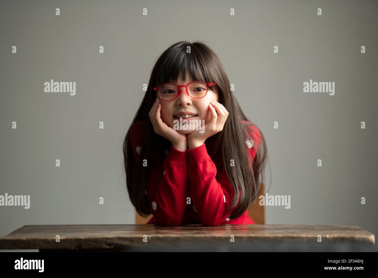 Resting chin on hand hi-res stock photography and images - Alamy