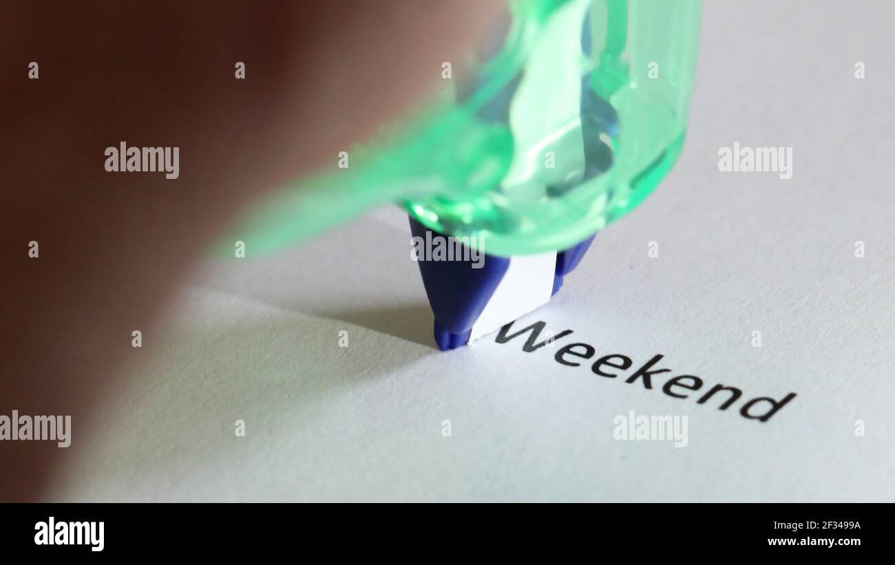 A back to work, weekends finished or over concept. The word weekend is partially covered by correction tape. Forgettable weekend. Working all weekend Stock Photo