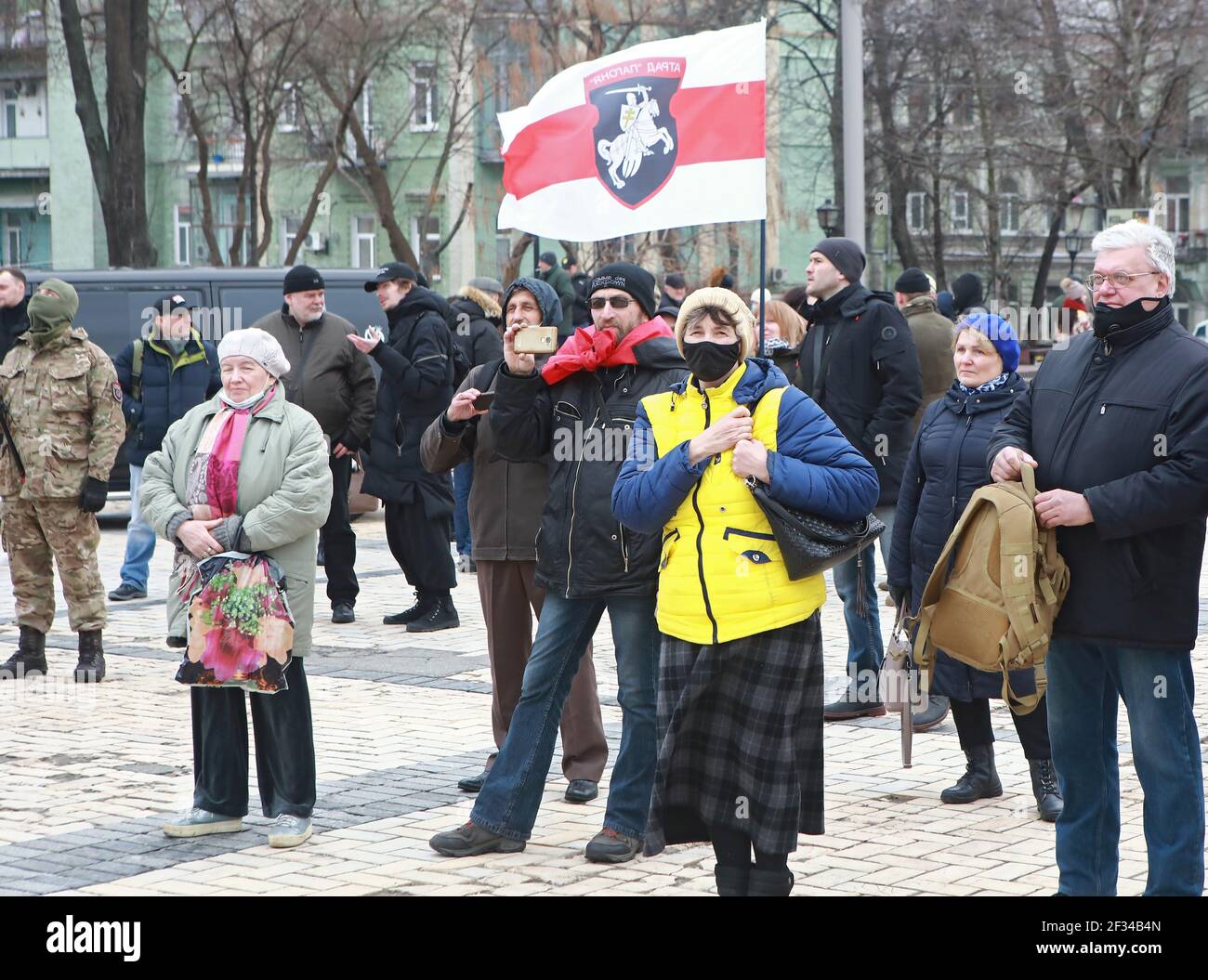 KYIV, UKRAINE - MARCH 14, 2021 - People visit Mykhailivska Square on the Ukrainian Volunteer Day, Kyiv, capital of Ukraine. Stock Photo