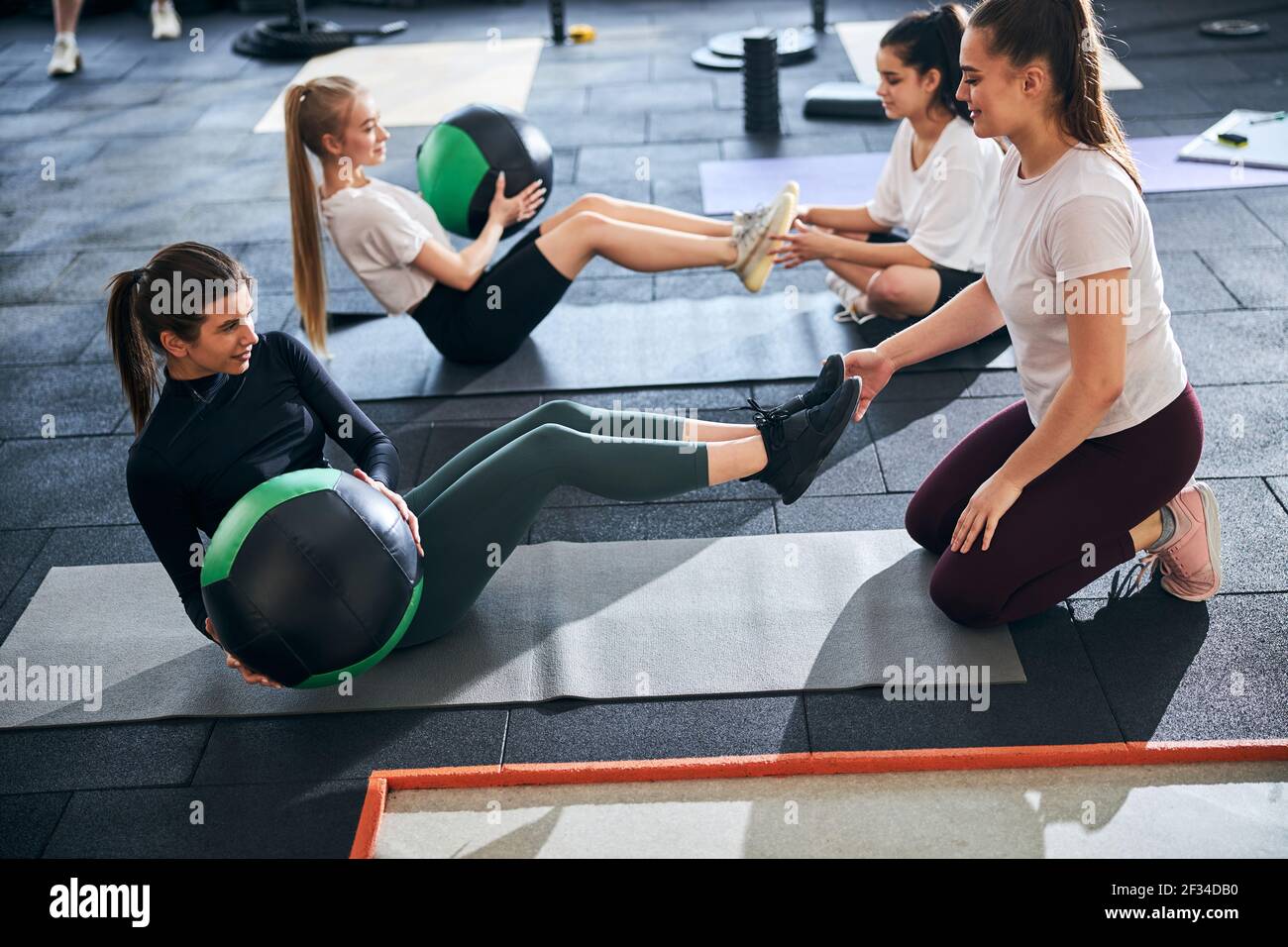 Effective training with gym buddies and proper equipment Stock Photo Alamy