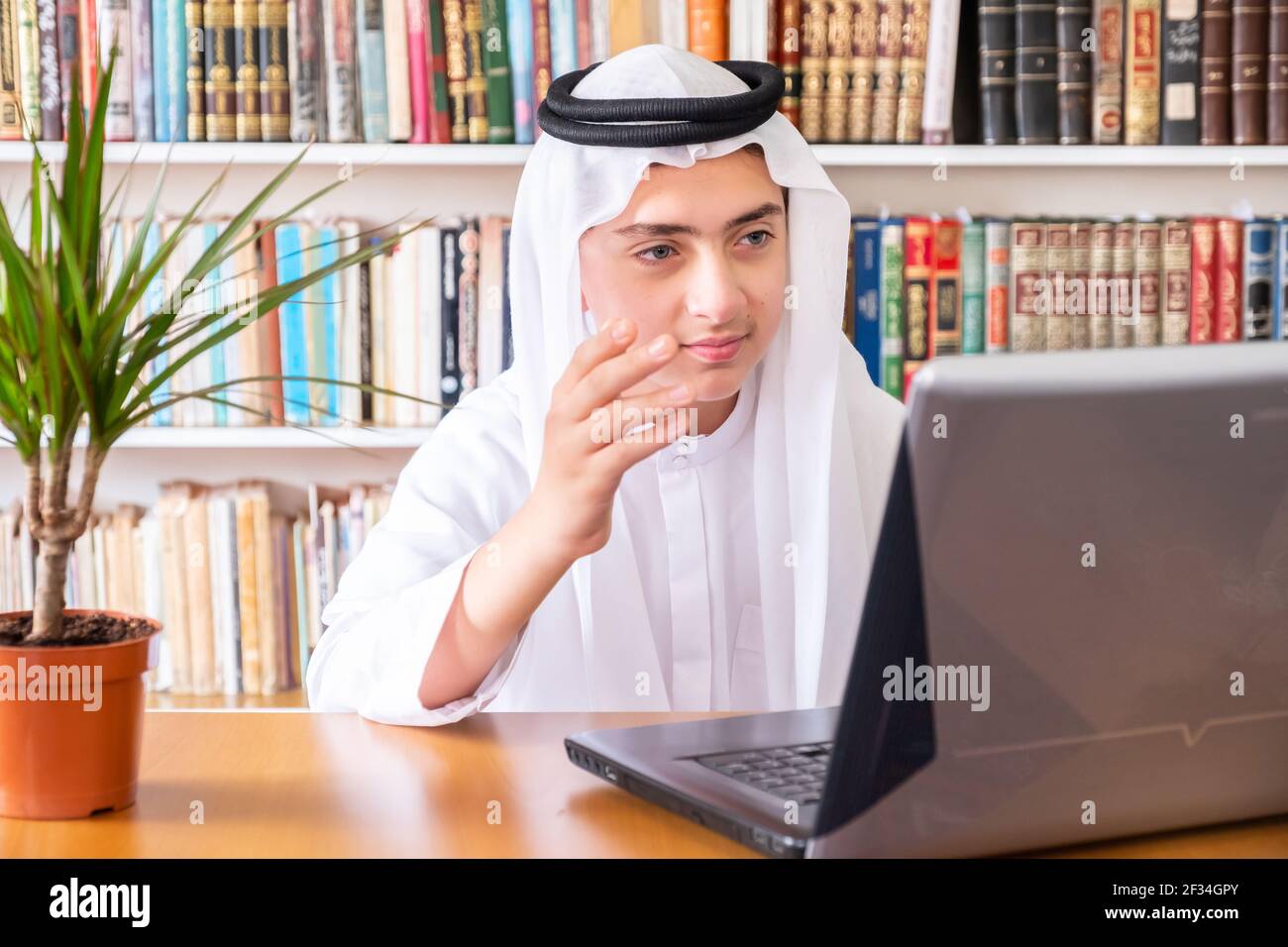 Aarabic muslim man using online technology Stock Photo